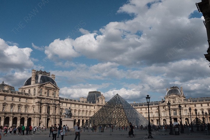 Paris Louvre museum pyramid wide view aesthetic travel photo