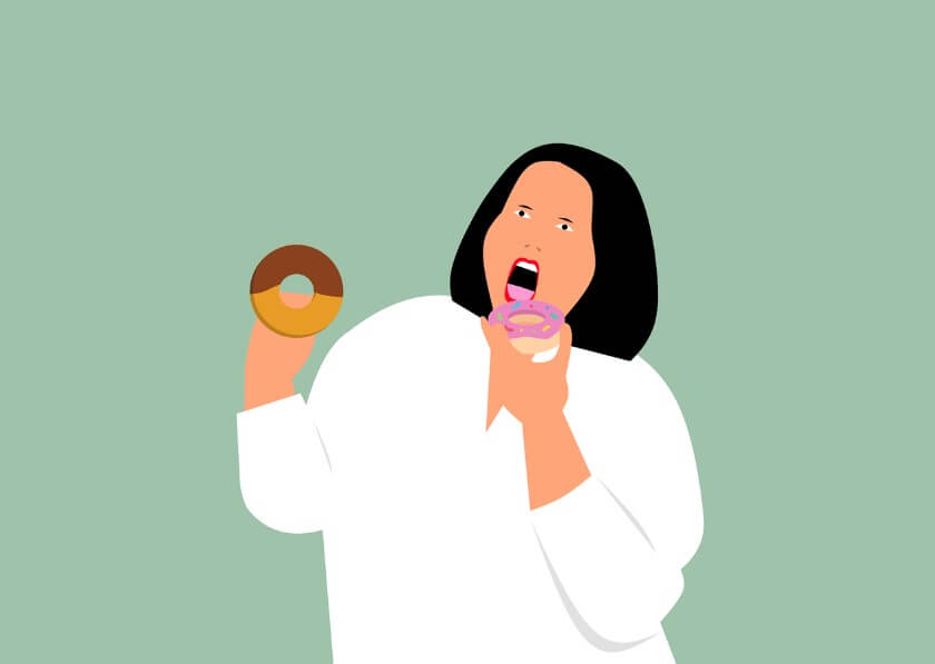 식욕 증가로 간식을 먹는 여성