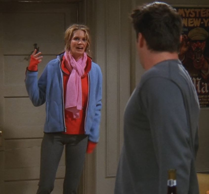 Janine talks with Joey&#44; Monica and Chandler in front of her room at the show FRIENDS