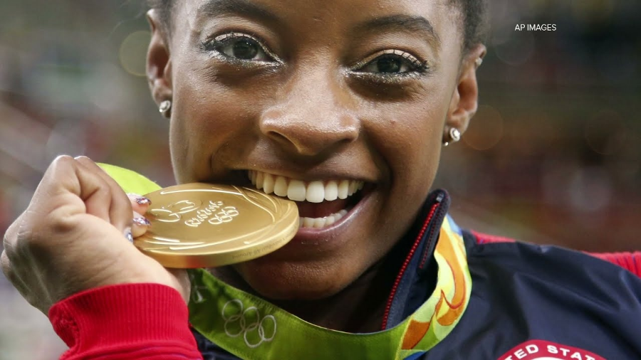 금메달 깨무는 이유