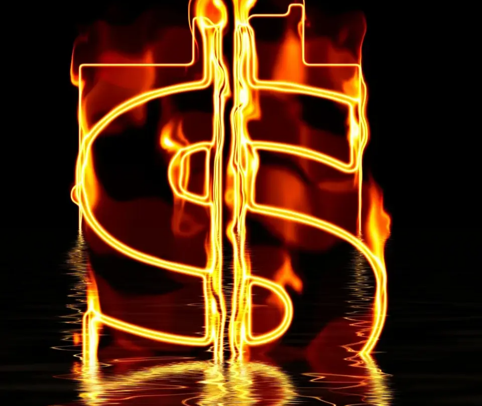 STOCK 타는 모습, 주식 소각을 연상시키는 이미지