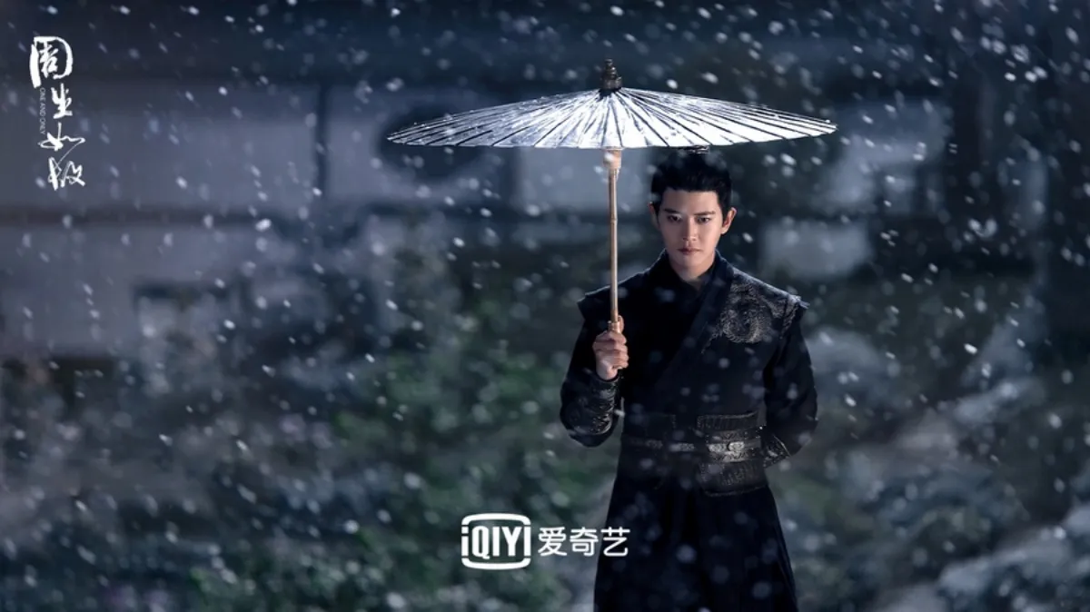 검은옷을입고-우산을-쓰고있는-남진왕