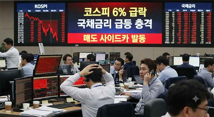 코스피 급락과 매도 사이드카 발동을 보여주는 증권가 상황.
