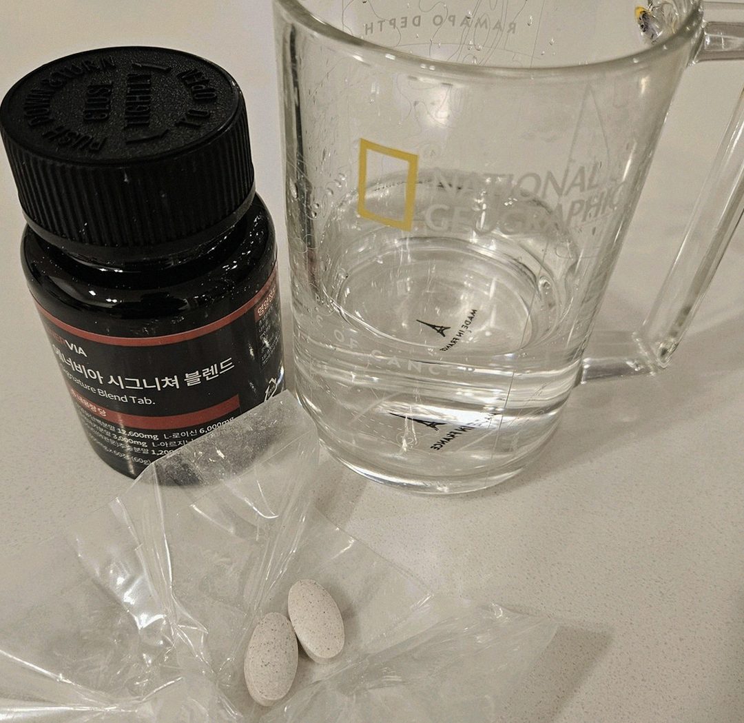 enervia tablets on palm showing size comparison
