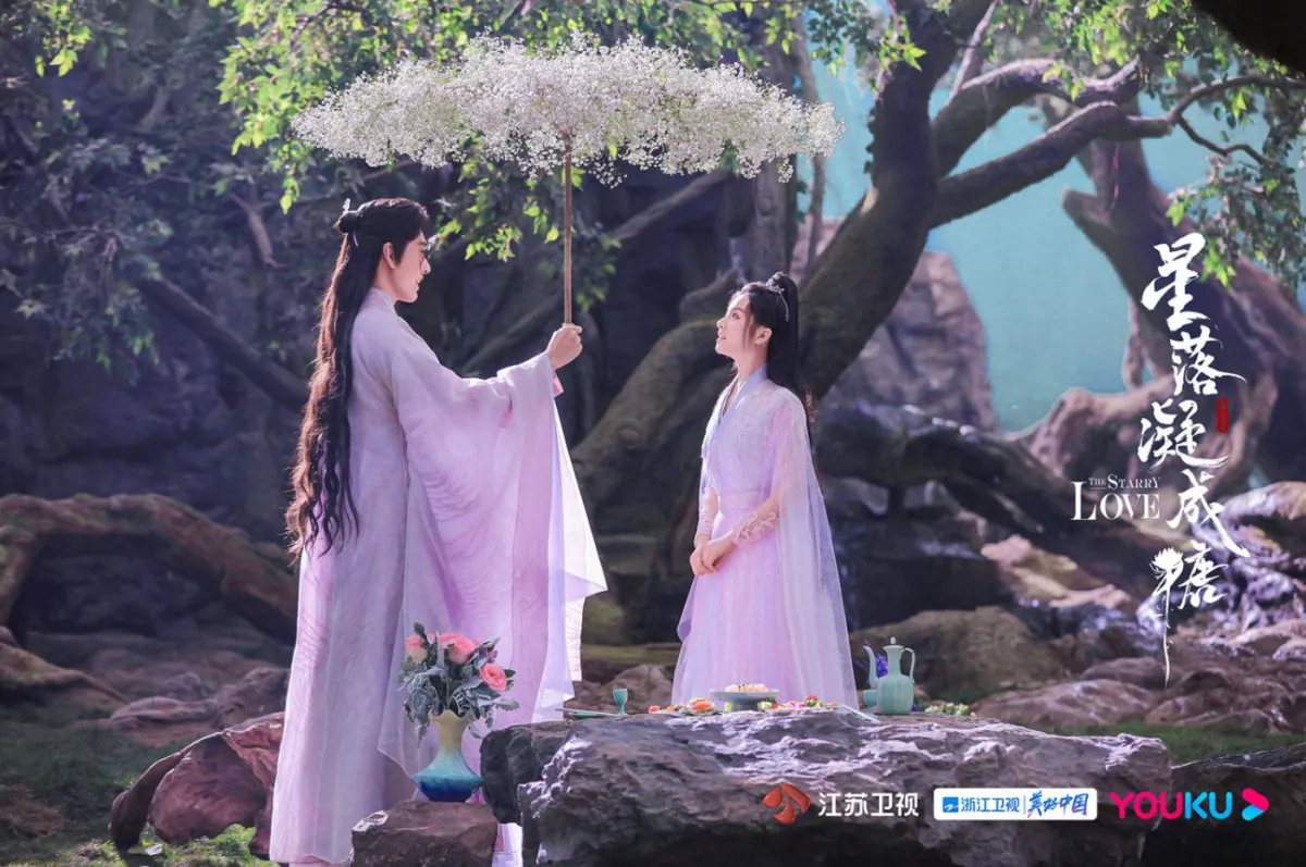 야담에게-꽃우산-씌워주는-문인