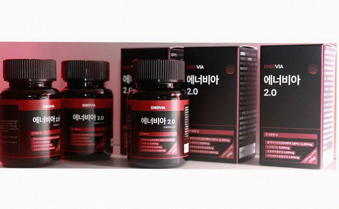Korean Asian man in his 30s organizing supplements on weekend morning at home