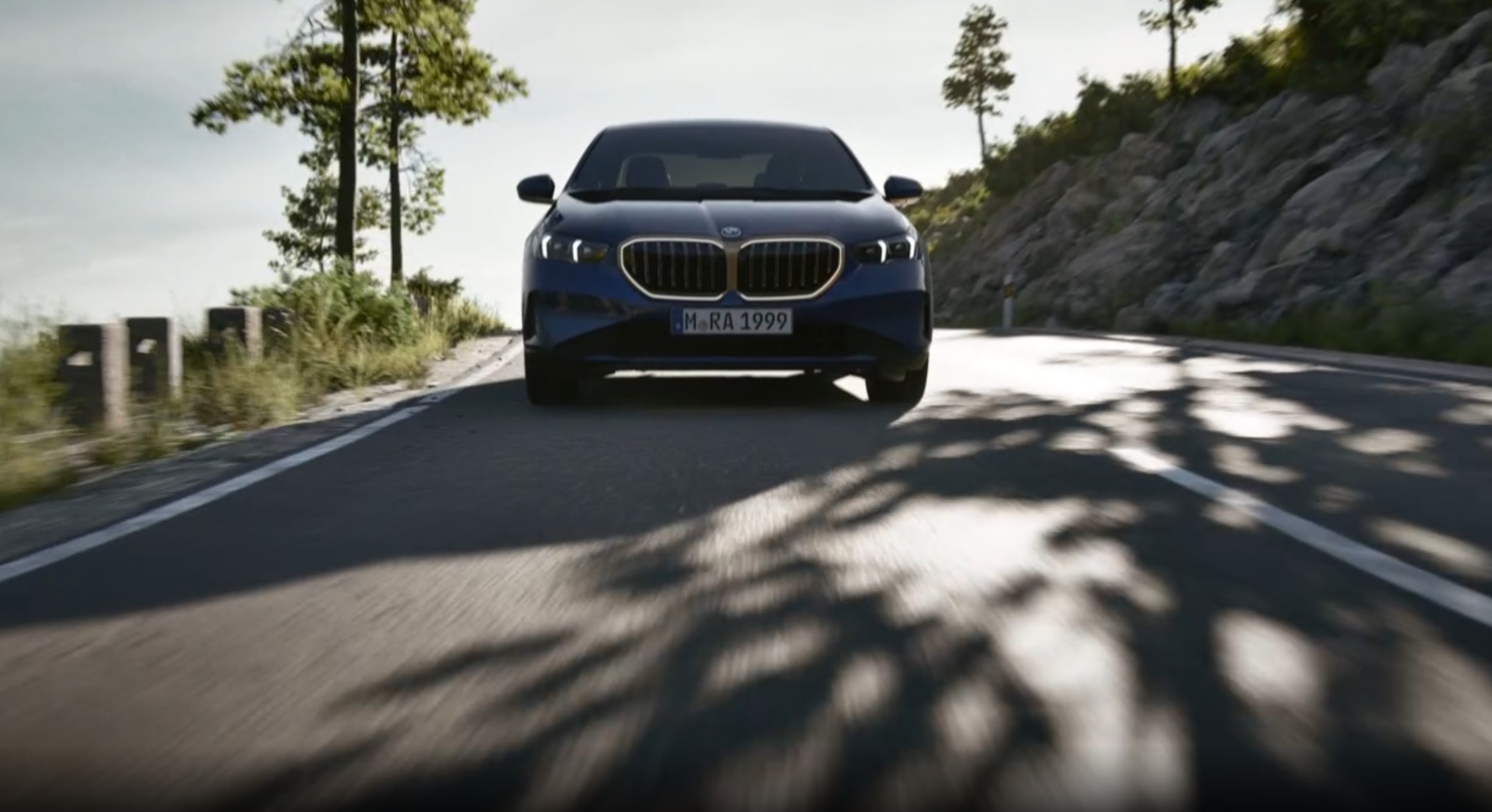 The new BMW 5 Series G60 driving on the road