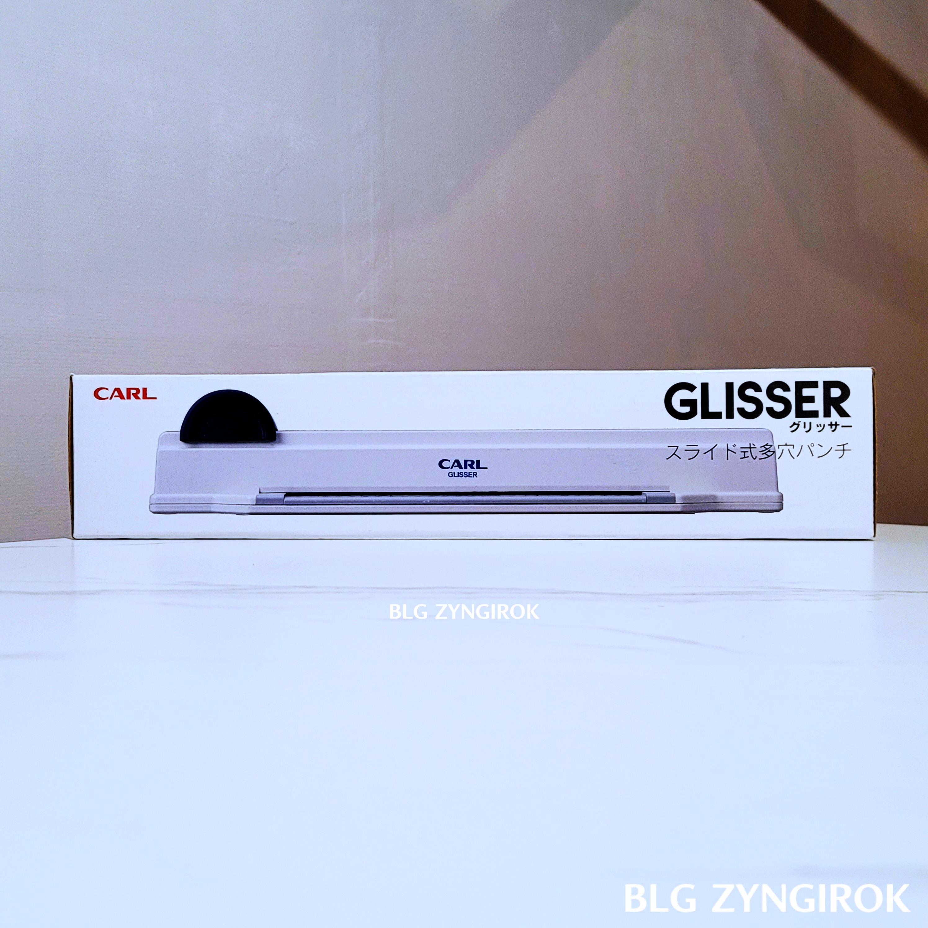 CARL-GLISSER-타공기가-테이블-위에-놓여있다.