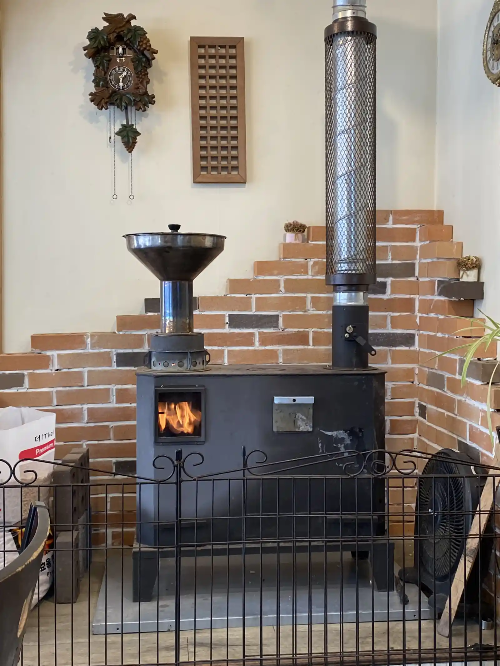 일산 보리밥맛집 빼꼼 보리밥 실내 벽난로 이미지