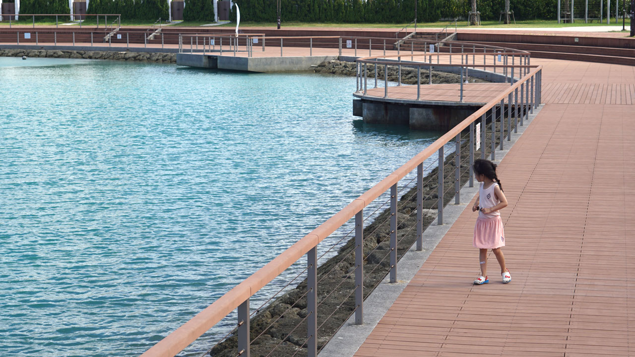 Take a walk while looking at the American Village beach.