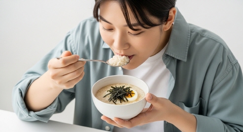 유산균 제품과 함께 약을 먹는 장면