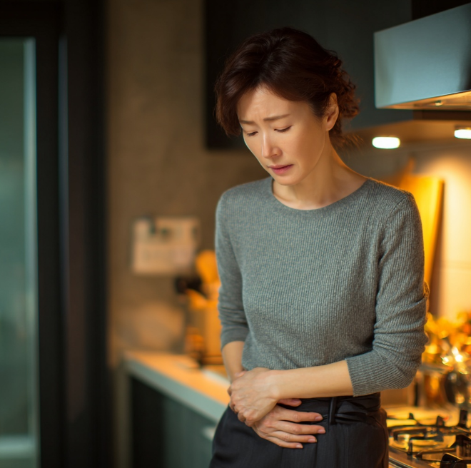 장염으로 인한 배아픈 고통의 아줌마