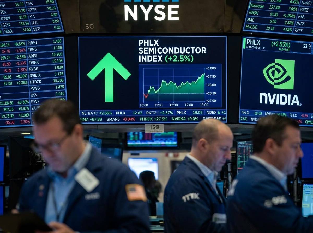 뉴욕 증시 전광판에 필라델피아 반도체 지수 상승을 나타내는 초록색 화살표와 엔비디아 로고