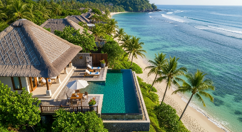 동남아시아의 고급 리조트 풀빌라에서 프라이빗 인피니티 풀 너머로 보이는 에메랄드빛 해변과 바다, 평화로운 휴양의 순간.