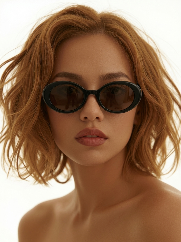 Draph Art AI model shot - model with curly hair wearing black oval sunglasses on a white background, made without a photoshoot