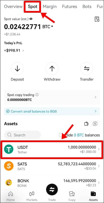 Spot(현물) 탭을 가리키고 있고, 하단에 USDT 잔고를 가리키고 있다.