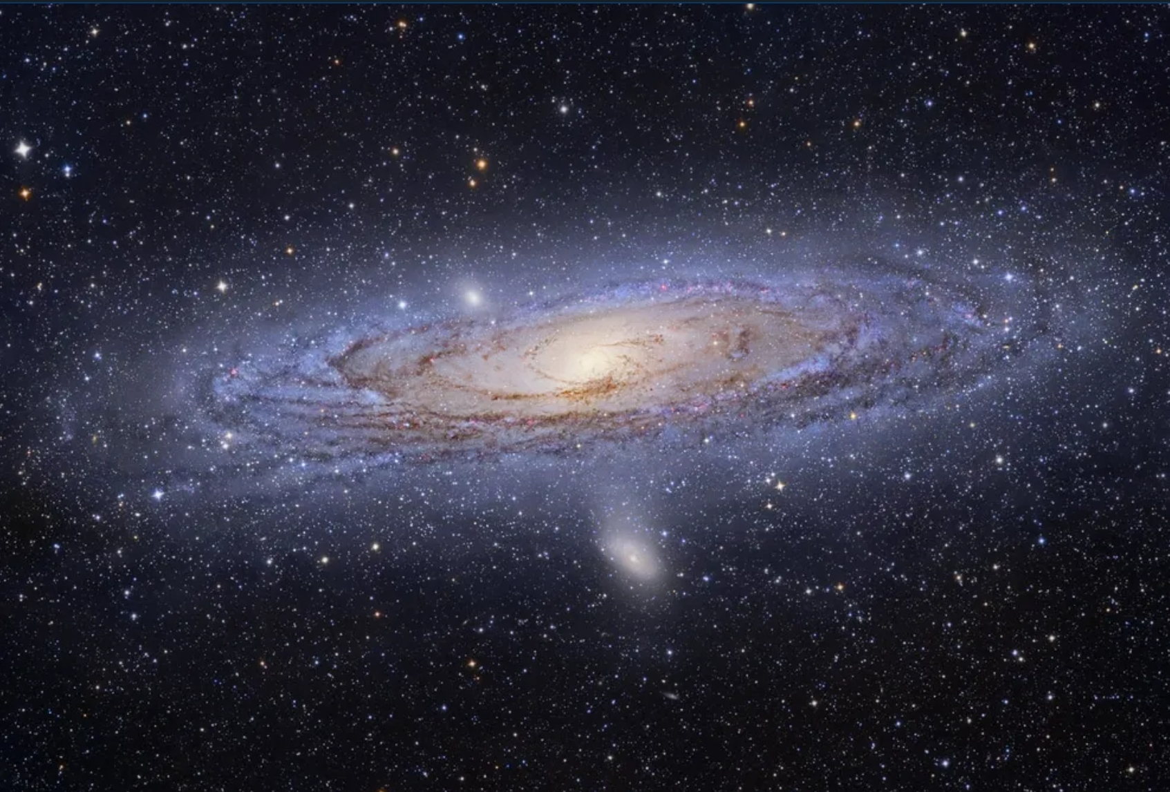 우리에게 잘 알려진 안드로메다 은하의 이미지 이다. 원반형태를 띄고 있으며, 중앙의 노란빛부터 바깥으로 갈수록 푸른색으로 보이는 모습이 몽환적이다.