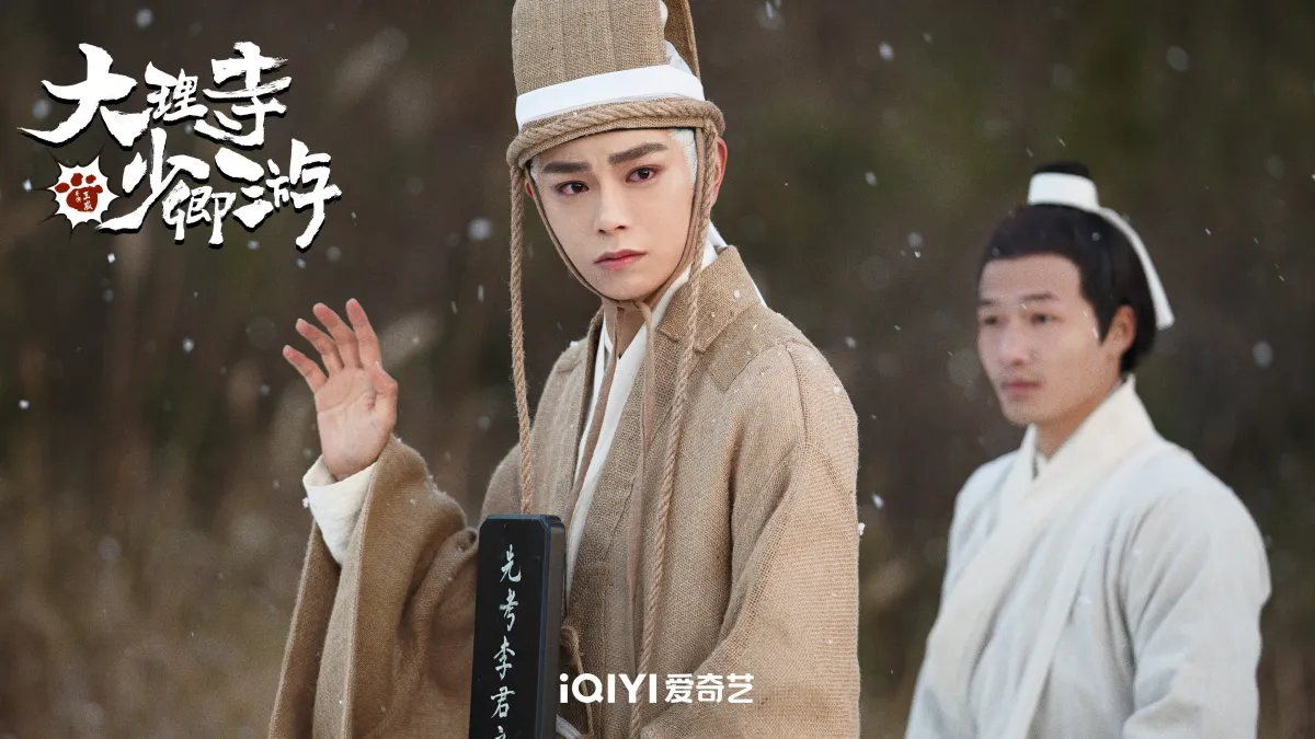 대리시소경유-정우혜-상복입고 위패들고 가는 모습