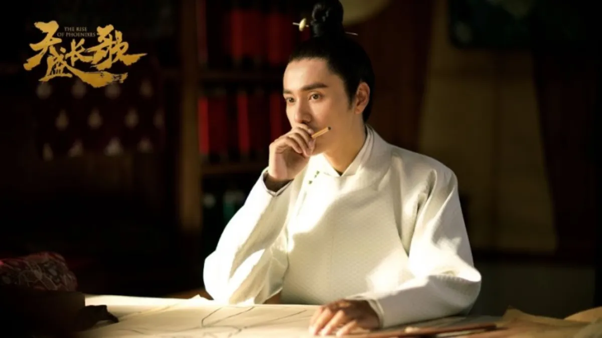 흰옷을-입고-붓을-들고있는-초왕