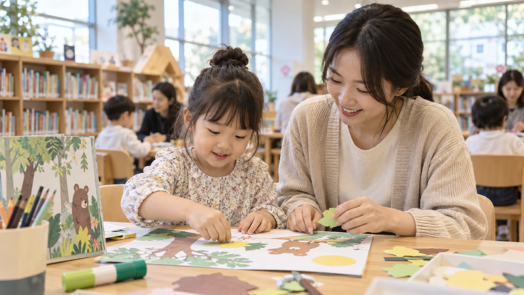 도서관 어린이 자료실에서 책을 함께 고르는 보호자와 아이