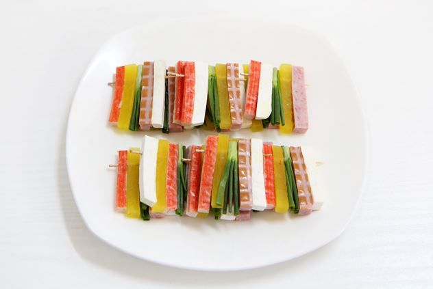 꼬치 꼬이기