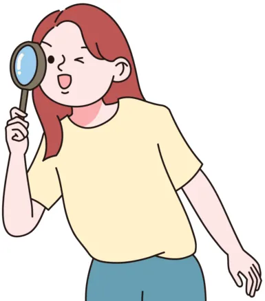 돋보기로 꼼꼼히 살피는 여성