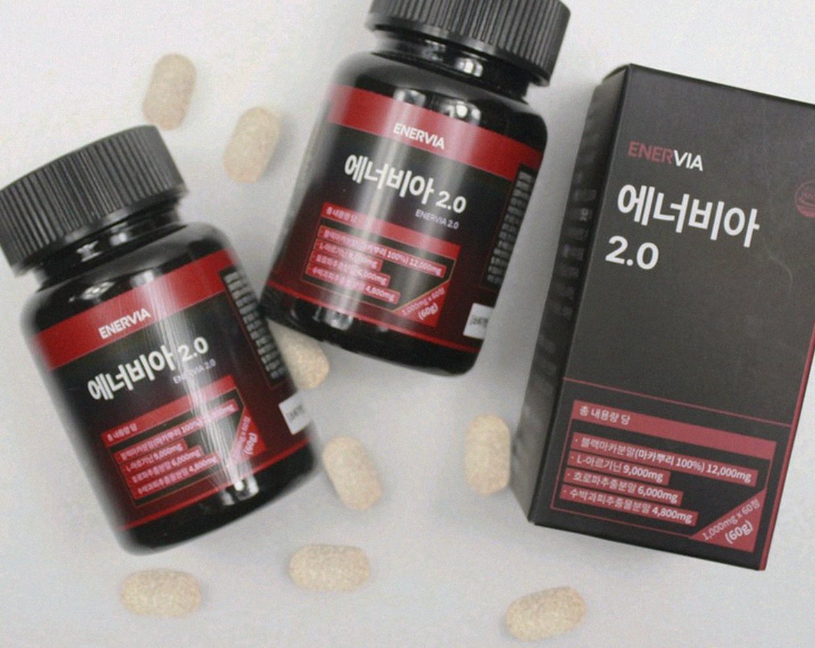 Korean Asian man in late 30s taking supplement after dinner