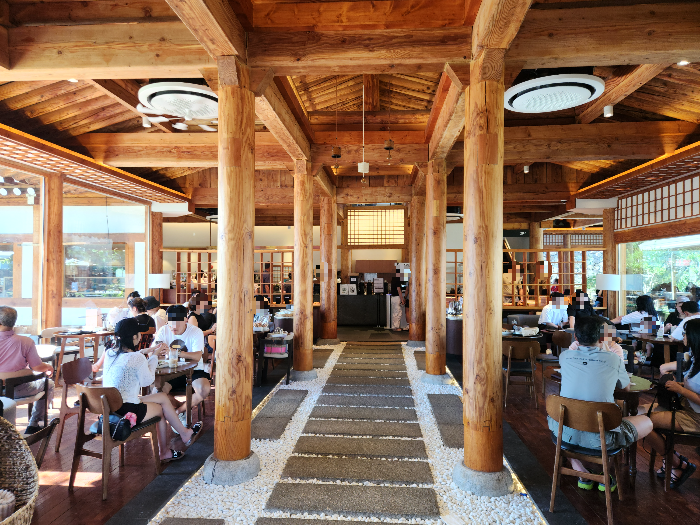 The cafe is crowded with people.
