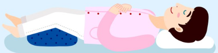 똑바로 누워서 다리에 베게 놓기