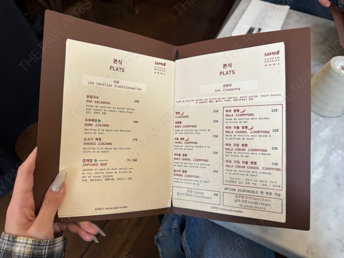 The inside page of SAMSO menu showing various Jjamppong options like Mala Cream Chadol Jjamppong with prices ❘ La page intérieure du menu de SAMSO avec les options de Jjamppong
