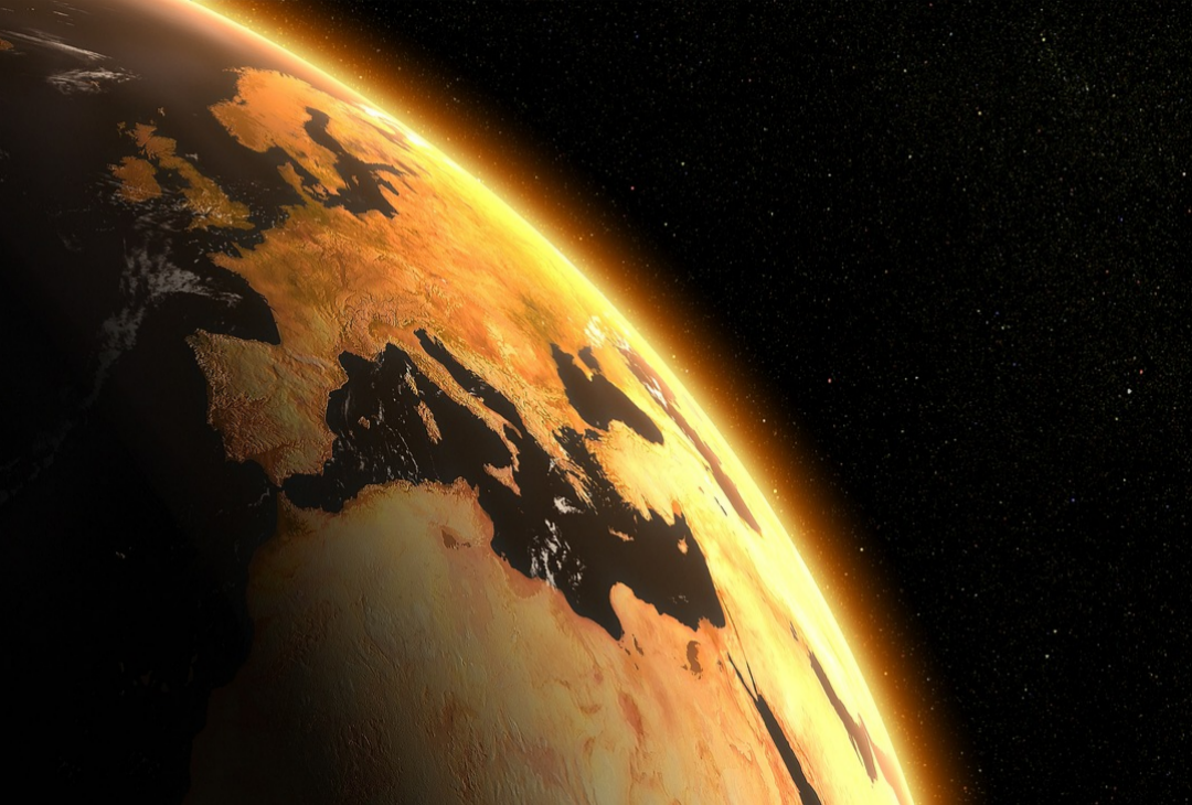 우주에서-본-지구는-환경이-파괴되어-황금색-지면으로-변하여-있다.