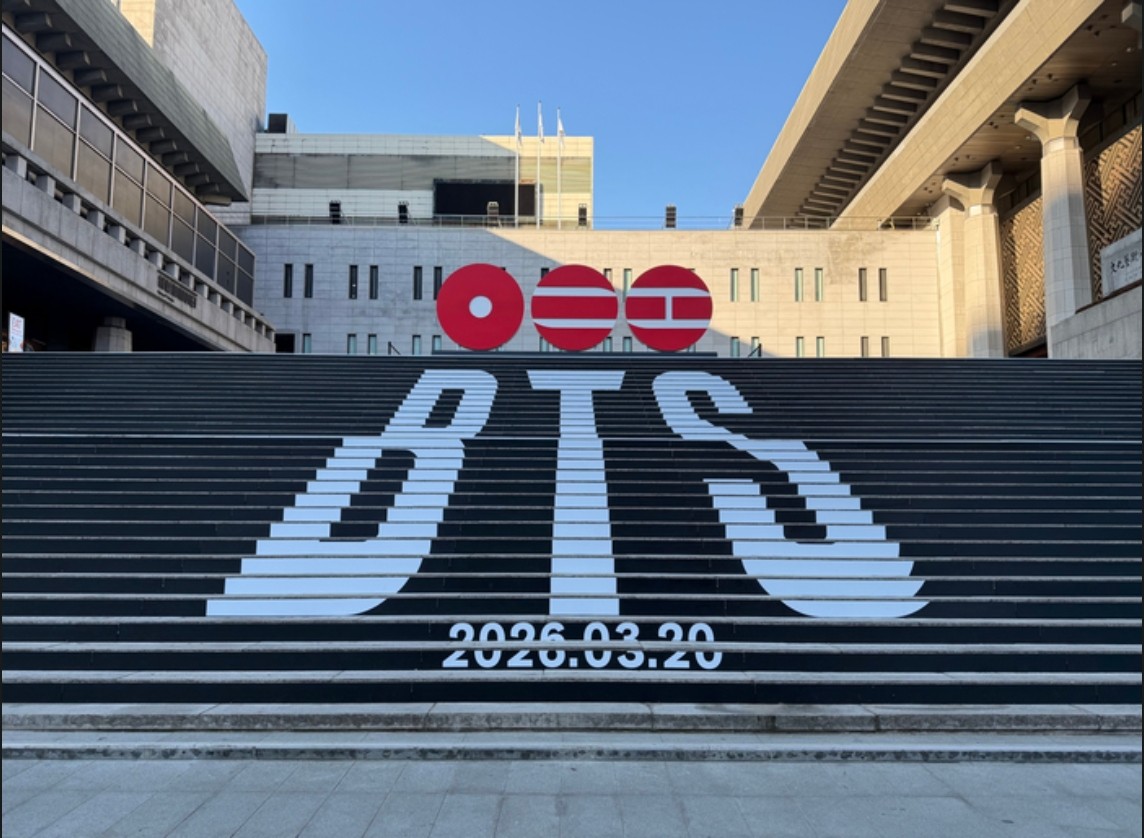 BTS first comeback concert after four years promotional poster showing BTS logo and date 2026.03.20 on public plaza