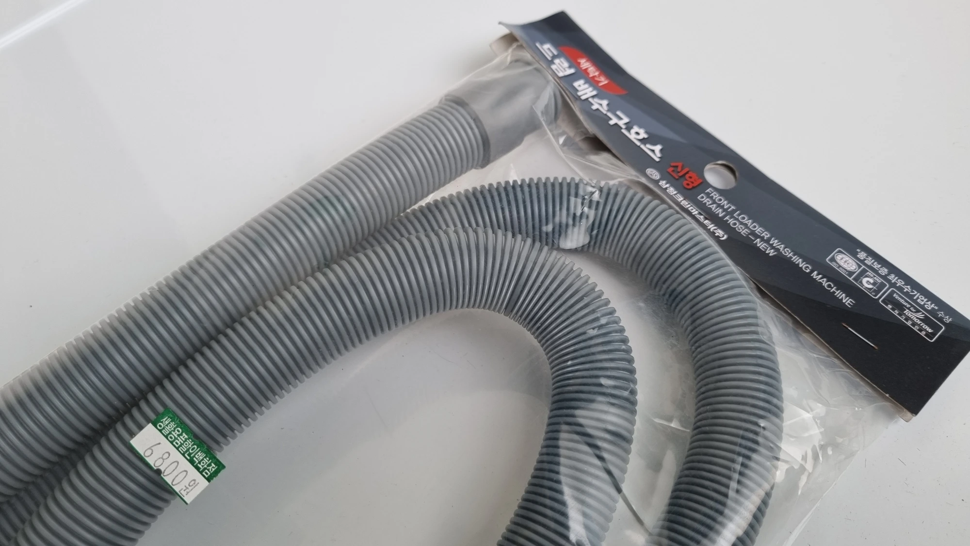 연장용 드럼세탁기 배수관