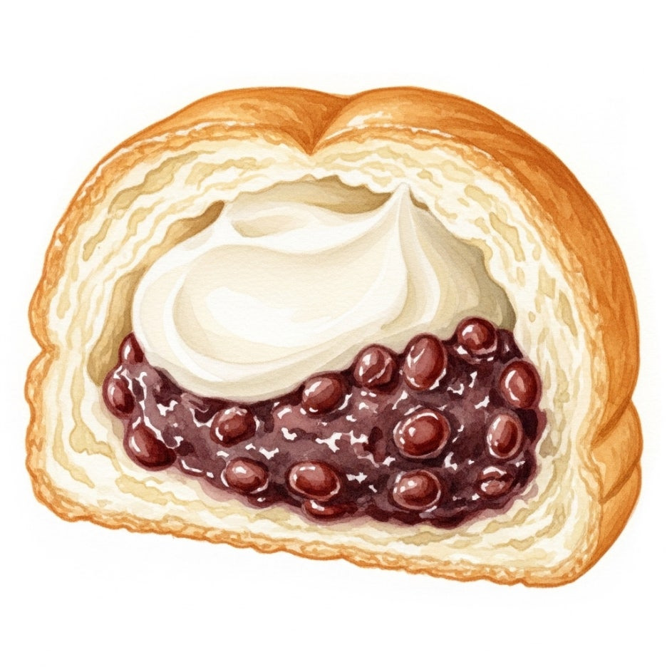 부드러운 크림과 앙금이 가득 찬 빵의 단면 모습