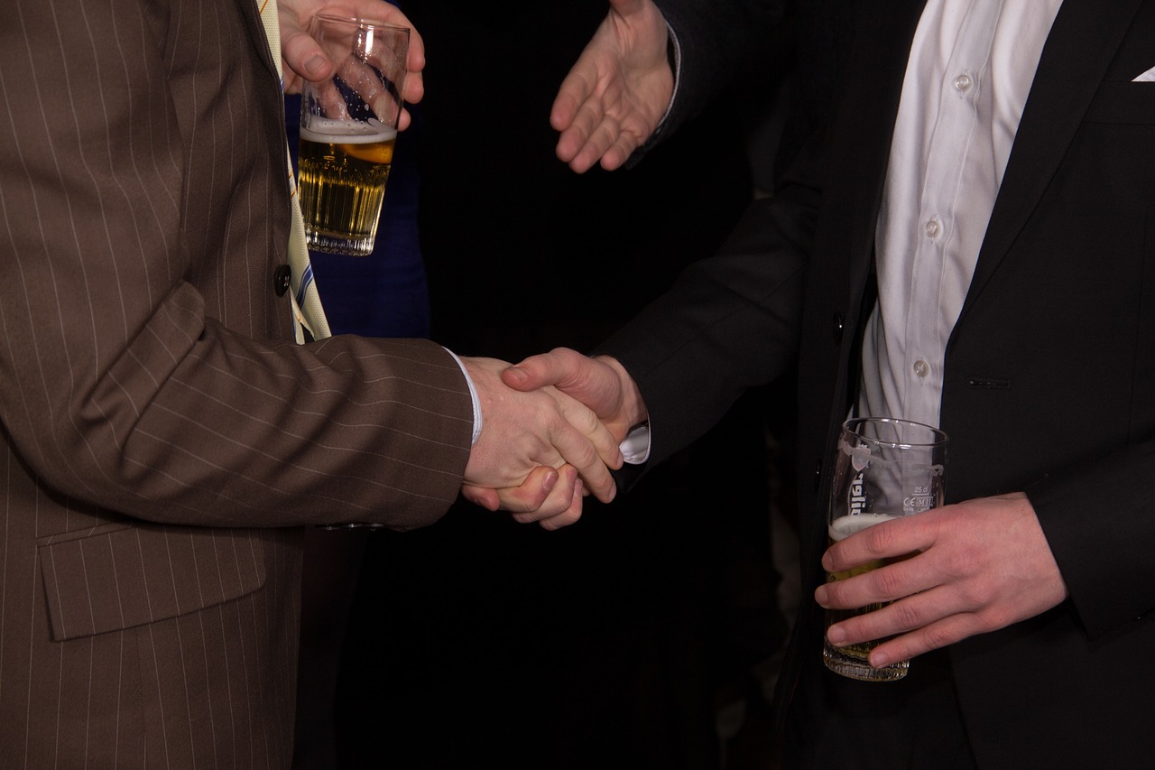 거래하는 사람들, 악수