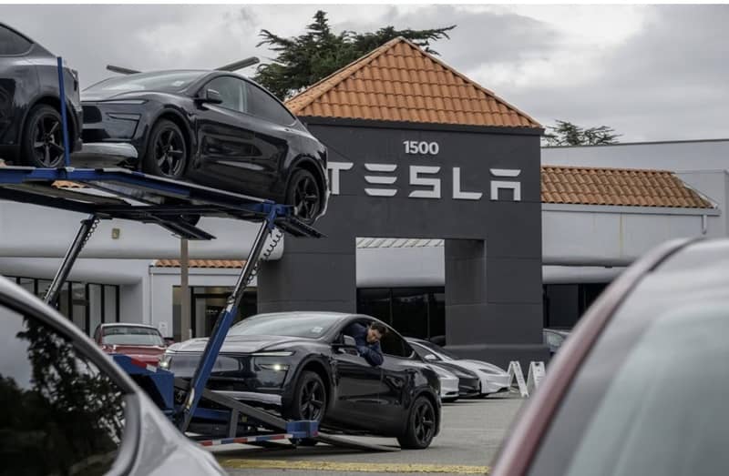 Tesla shares declined on Wednesday. David Paul Morris/Bloomberg News