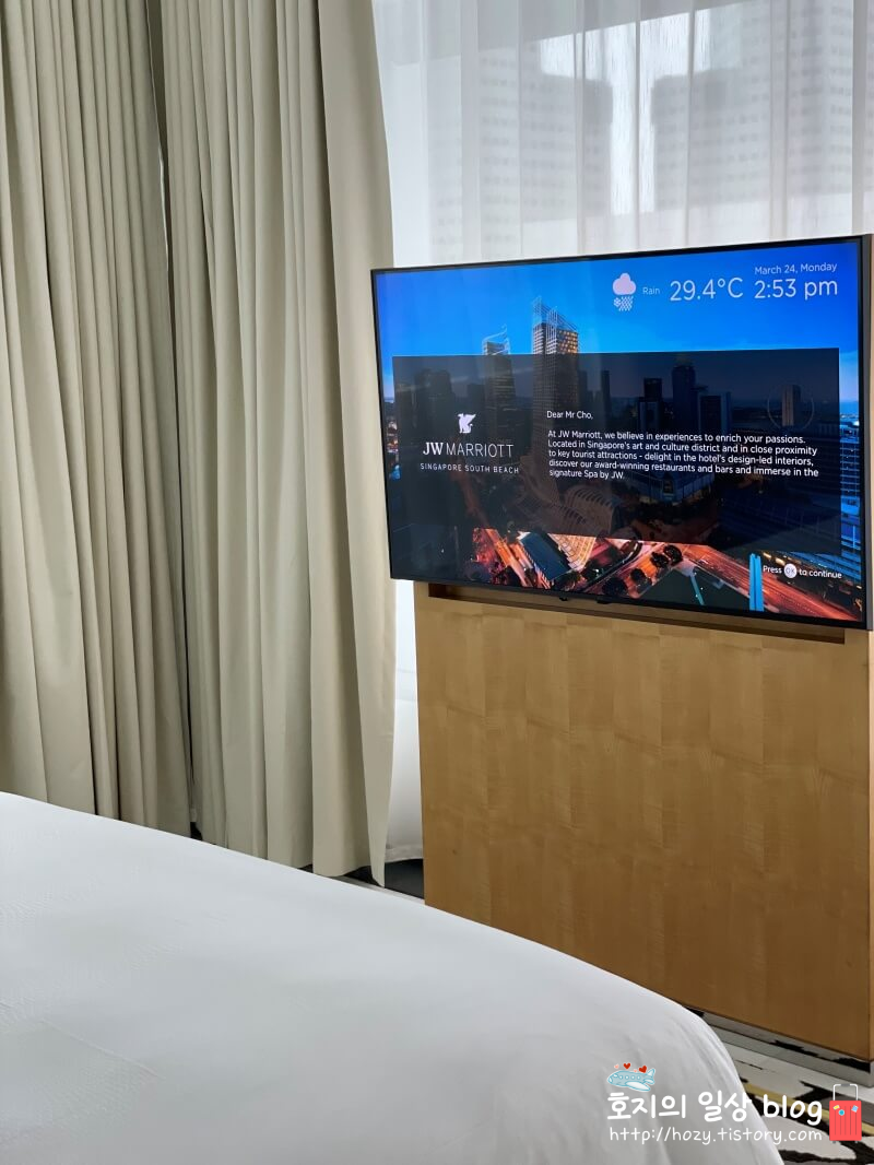 JW메리어트 싱가포르 디럭스 스위트룸 침실 창가뷰