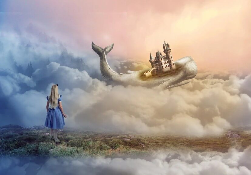 구름위에 돌고래와 사람이 있는 모습