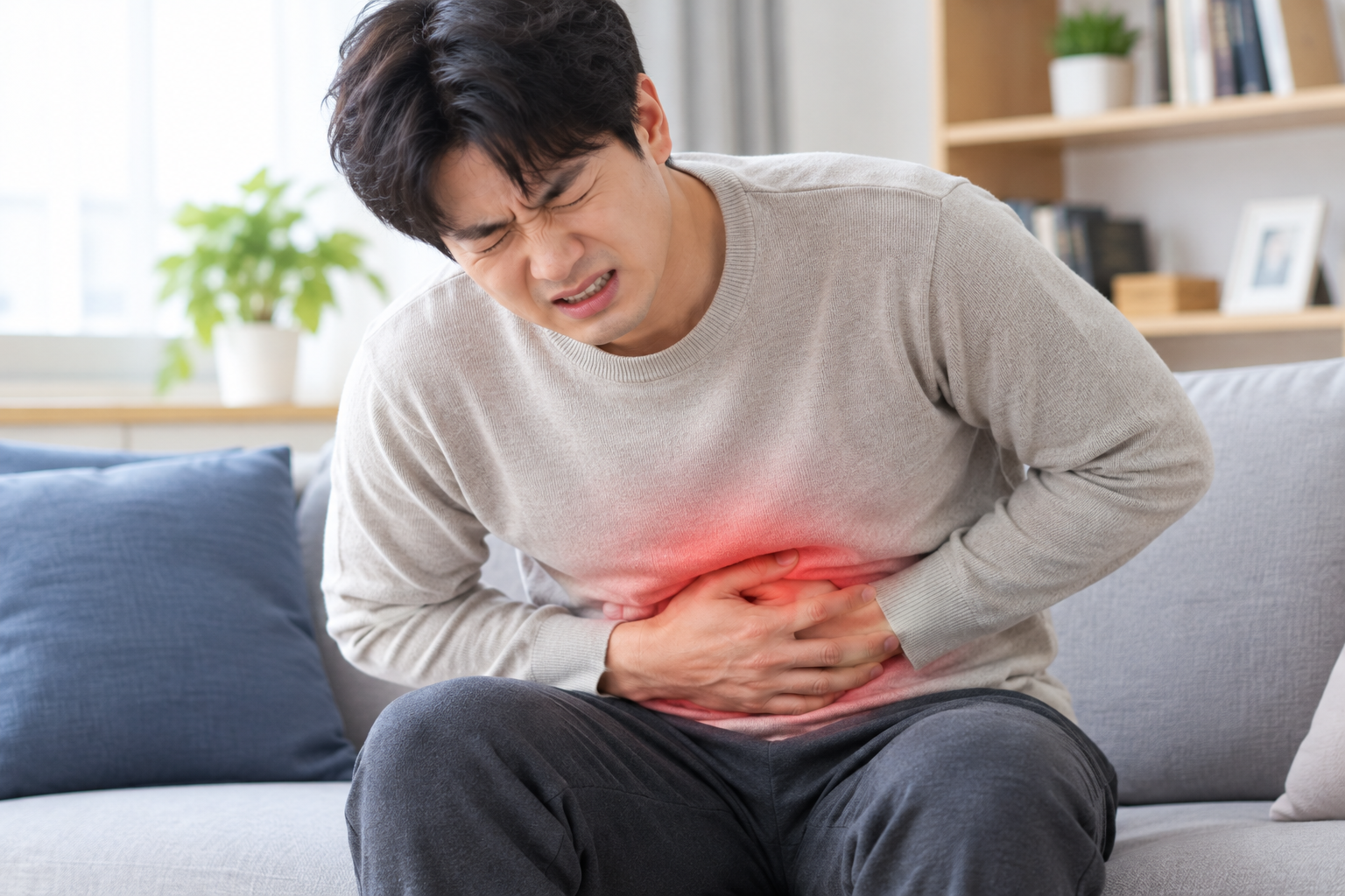 췌장염으로 배아파하는 이미지