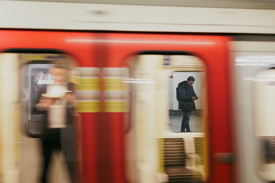 Urban subway scene with motion blur capturing daily commuting life.