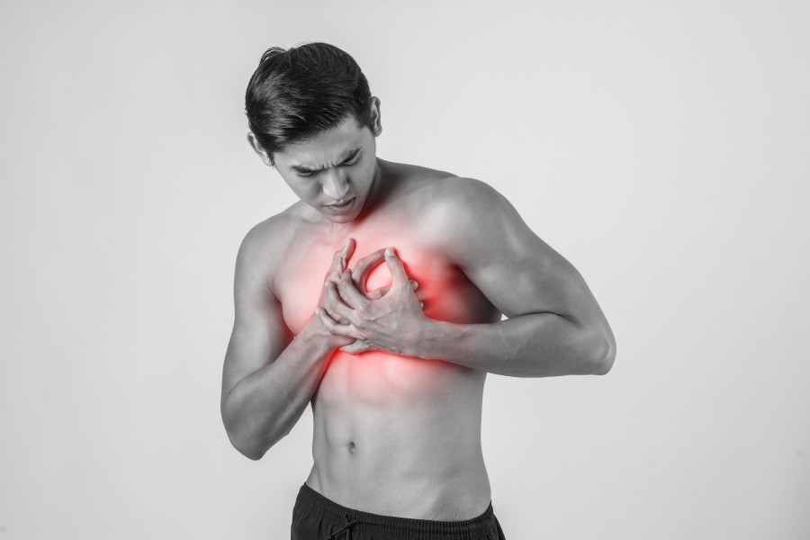 young-man-has-heart-attack-isolated-white-background-900