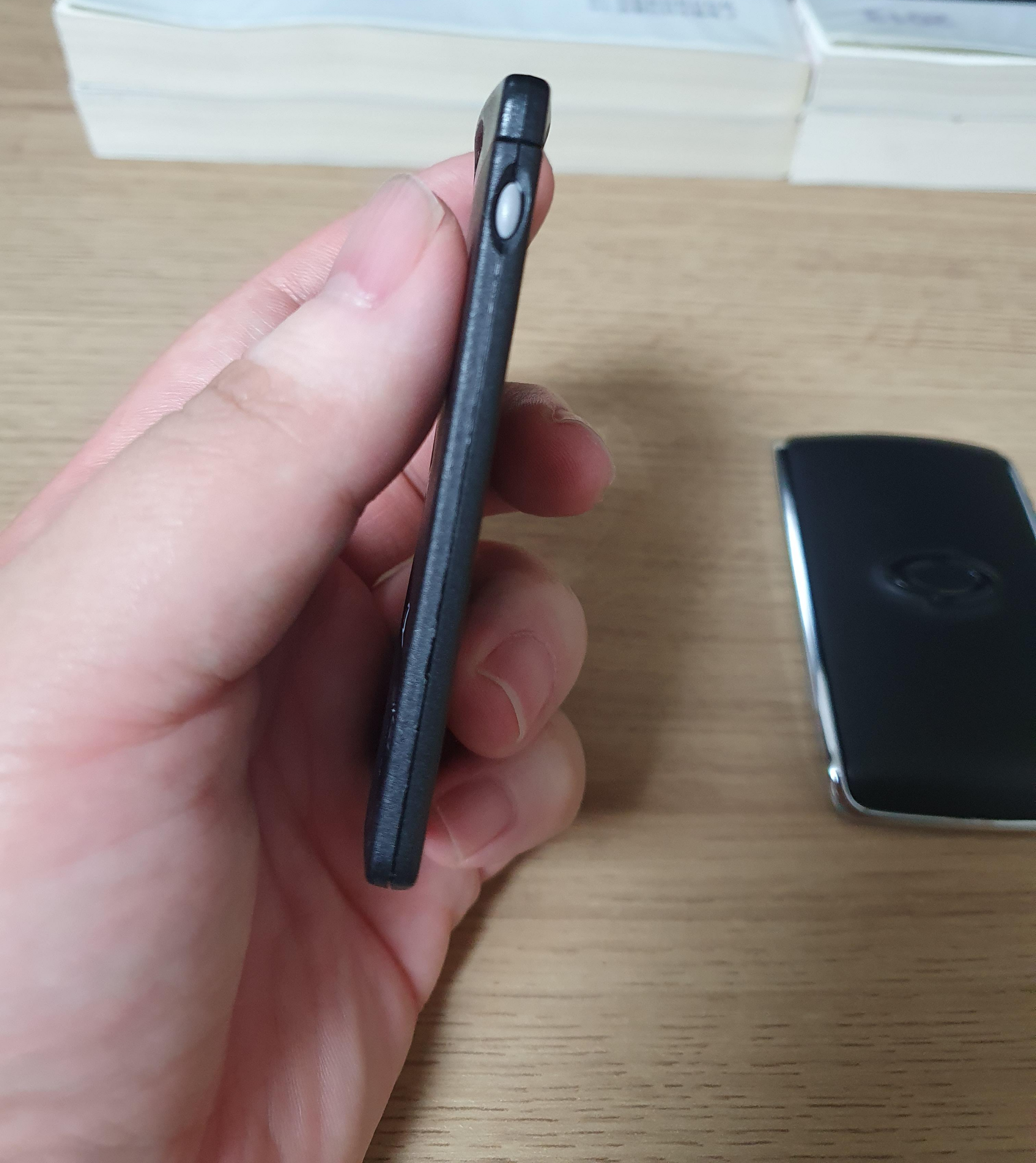 SM7 스마트키 측면 버튼