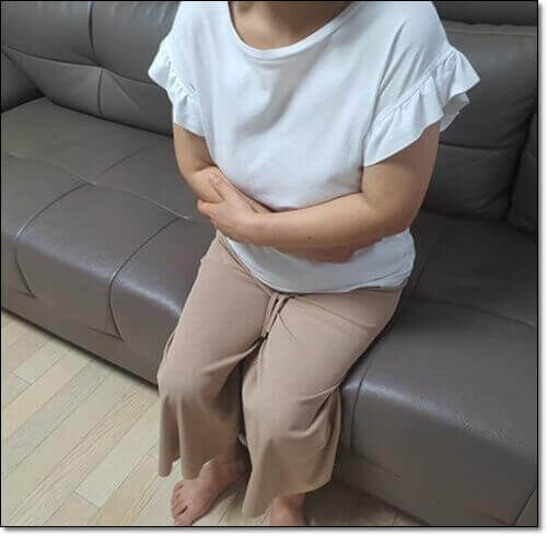 소화장애 여성