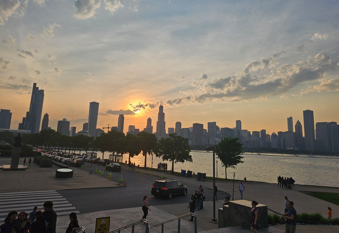 chicago skyline, in front of the planetarium at sunset