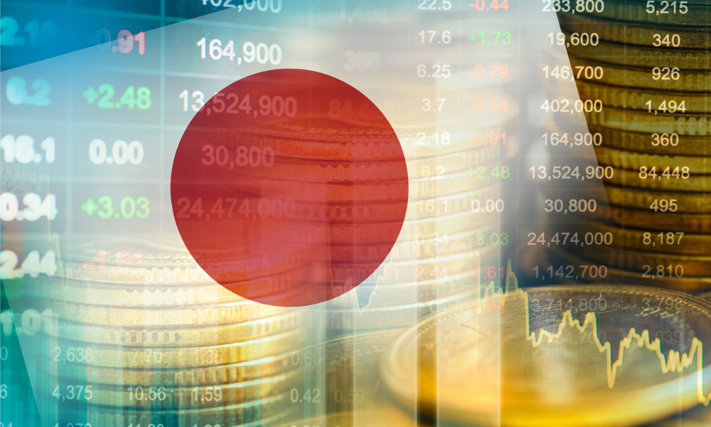 일본국기와 주가정보가 배경에 있는 이미지입니다.