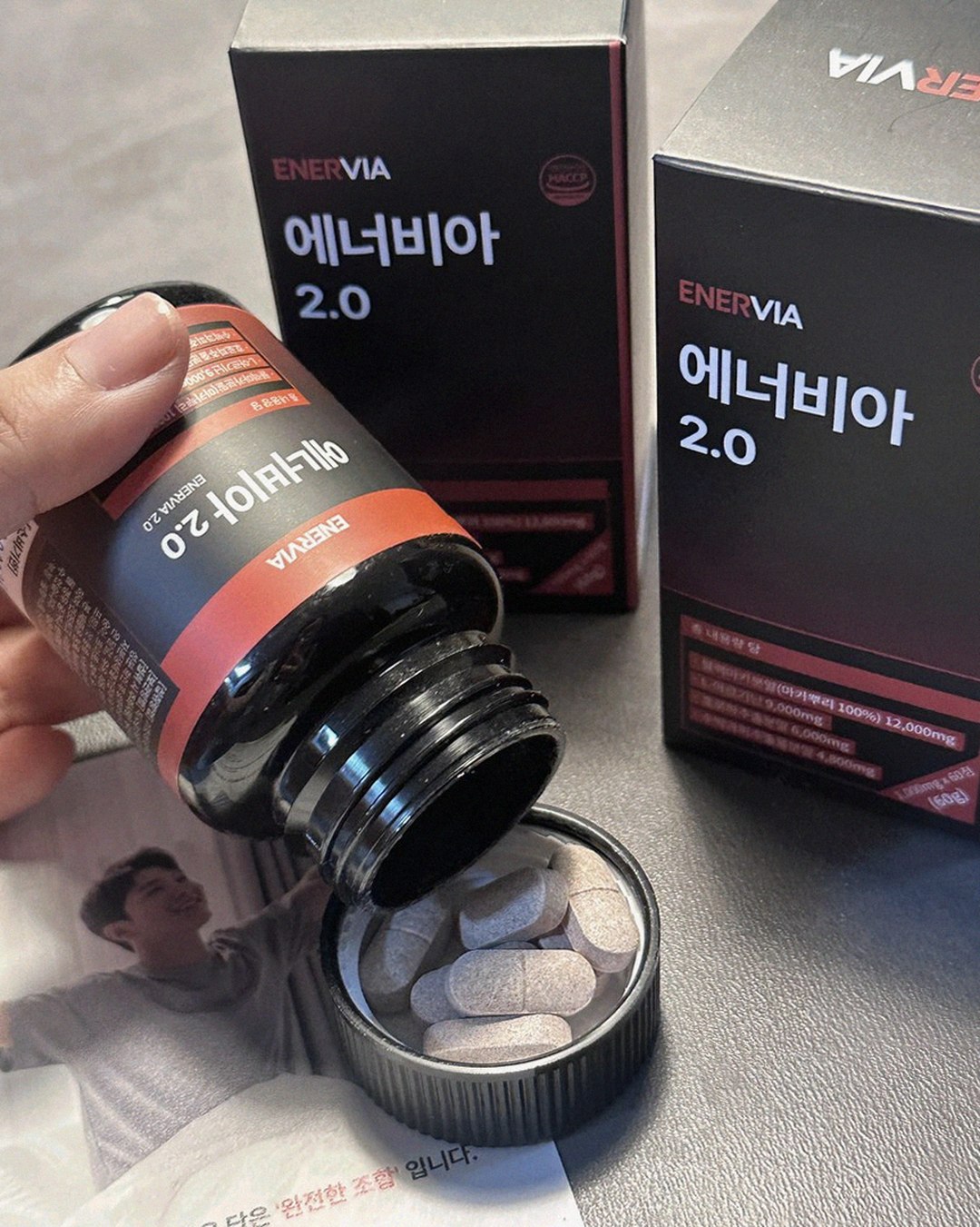 enervia 2.0 bottle on table with water glass