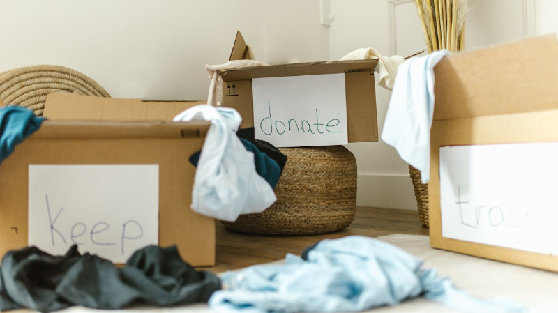 cardboard boxes with clothes