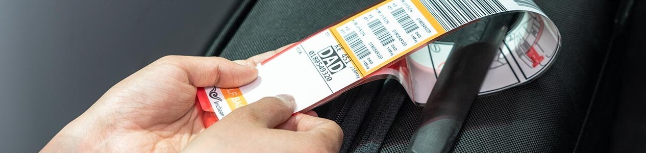 수하물-태그-부착