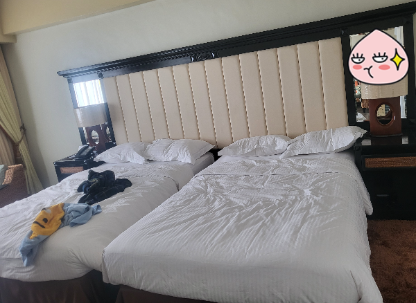 막탄 스위트룸 가든뷰 침실