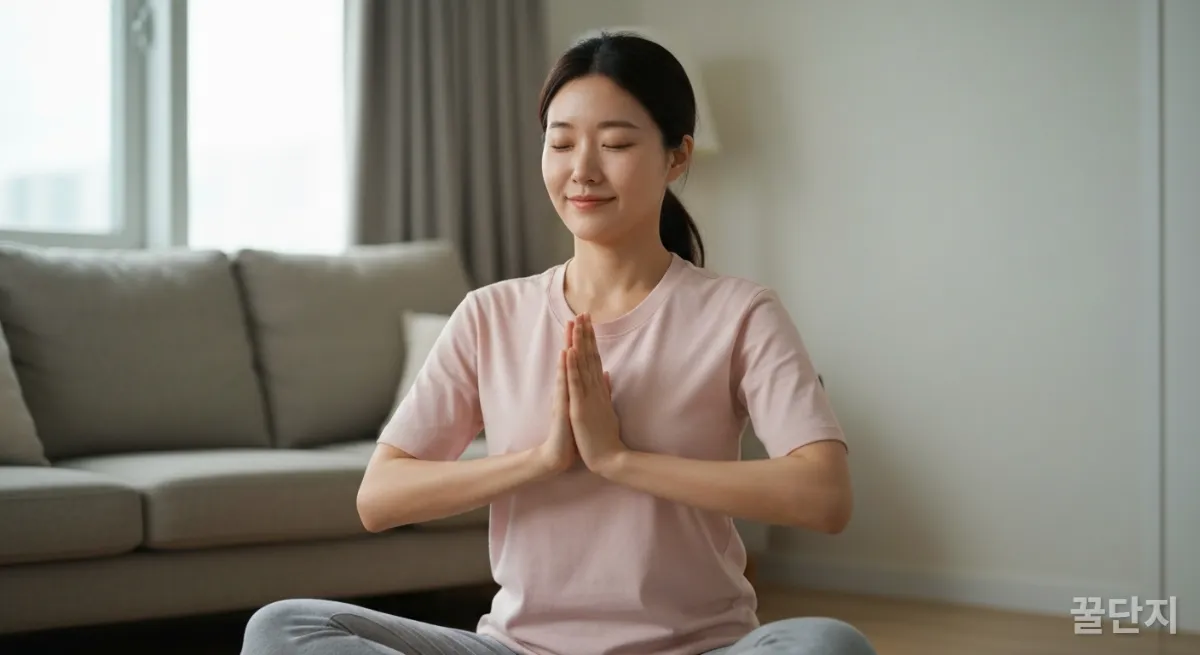 명상으로 스트레스를 해소하는 젊은 한국 여성